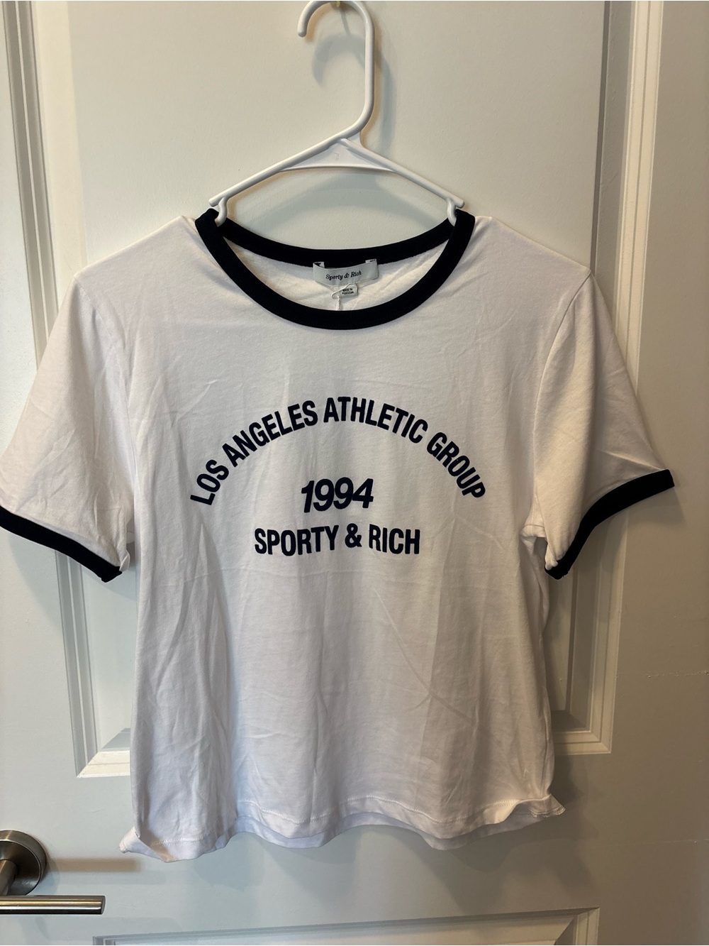 Sporty & Rich White Tee with Navy Trim and Navy Graphic